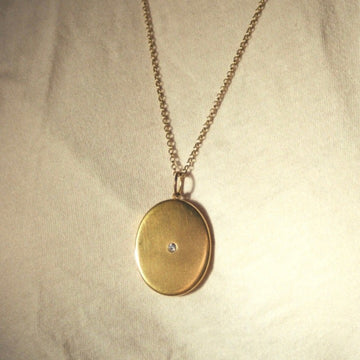 1910 14k Gold Diamond Locket