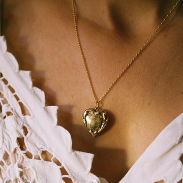Gold Fill Locket with Risen Frame and Heart Motif